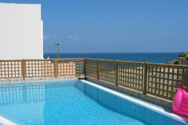 The pool at Villa Andreas overlooks the sea