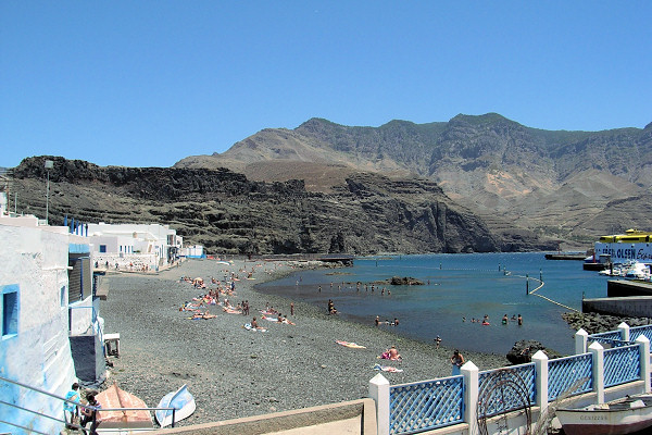 The nearby volcanic beach