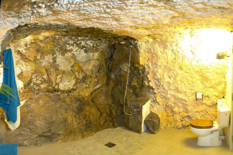 The shower room inside the natural cave