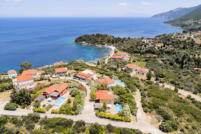 Mouzakis Villas (the three villas with pools in the front centre)