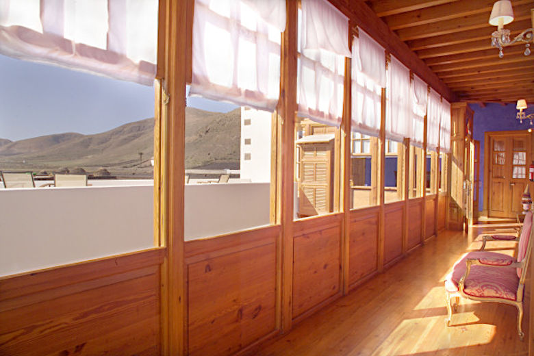 The wooden gallery leading to the upper-floor bedrooms