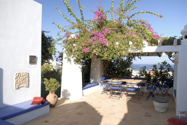 The dining terrace with views down to the sea