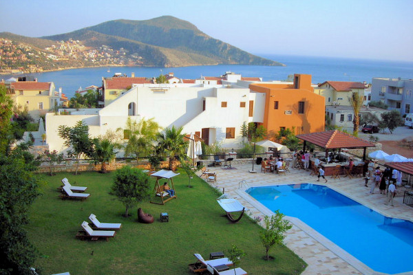 View across the pool and garden to the bay of Kalkan
