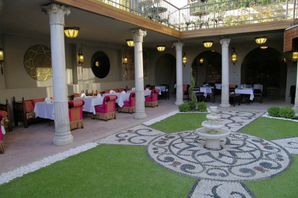 The hotel's courtyard garden and restaurant