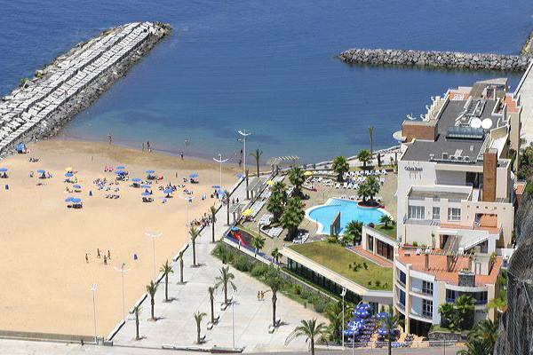 Calheta's sandy beach, with the hotel on the right