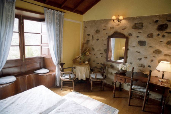 One of the prettily decorated bedrooms