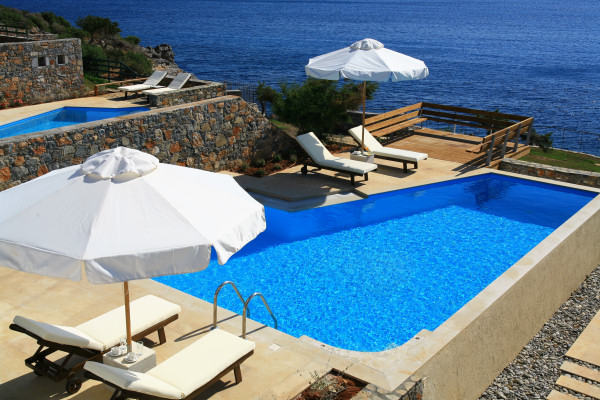 Each villa has a pool with sea views