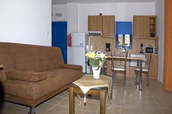 Living room with open-plan kitchen
