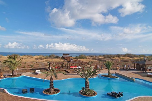 View across the pool to the beach
