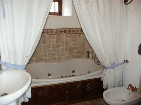 Bathroom with jacuzzi bath