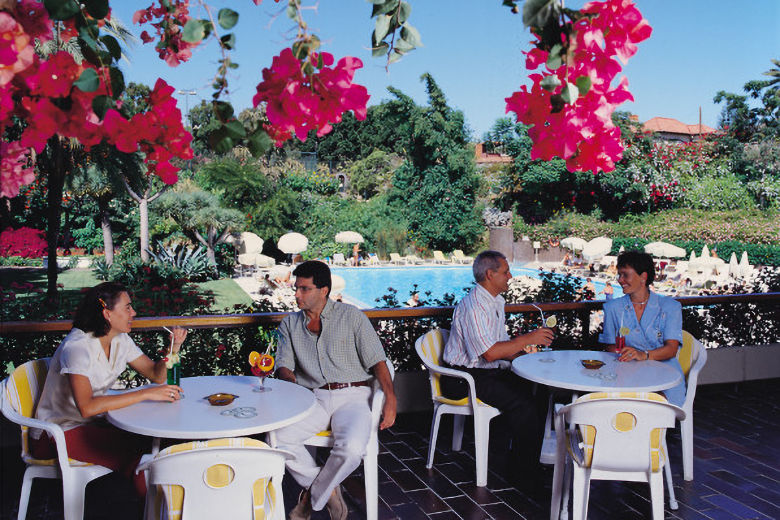 Terrace overlooking the pool and gardens