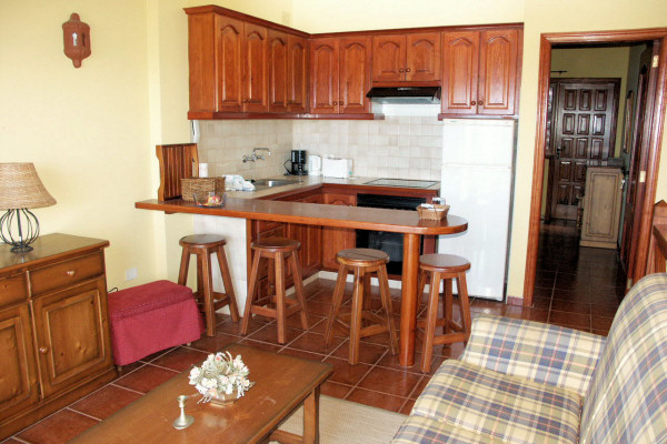 Living room with open-plan kitchen