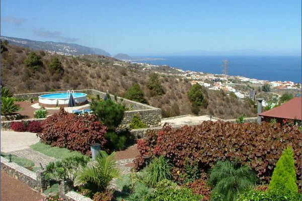 The swimming pool and view down to the coast