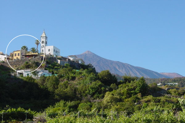 Casa Cho Juan (circled) stands on the hillside below the village church