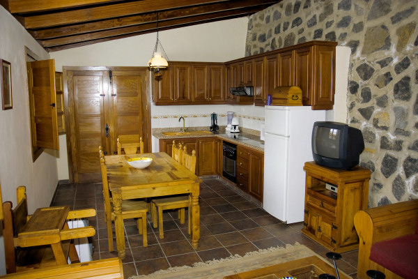Kitchen-dining area in an apartment at La Tanquera