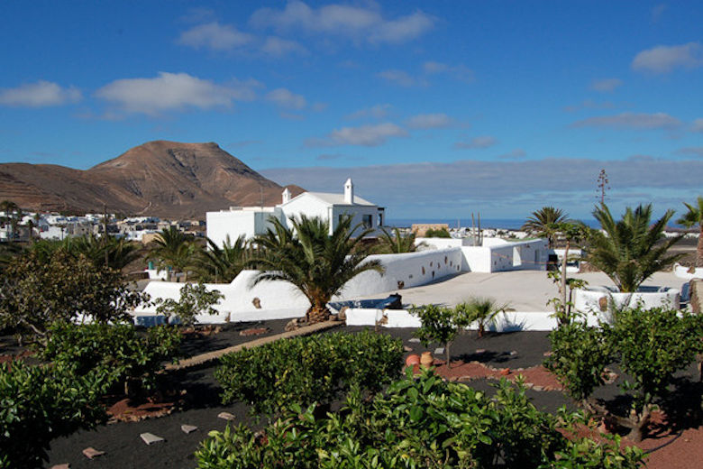 Casa de Hilario stands on the edge of Yaiza, surrounded by volcanic scenery