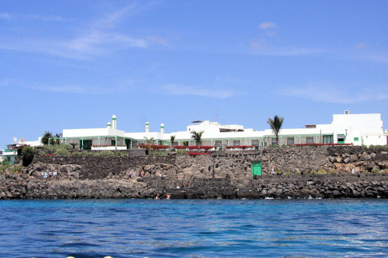The Casa del Embajador stands above Playa Blanca's seafront promenade
