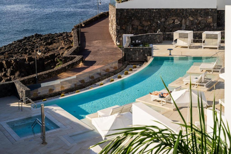 The pool area and coastal path to the marina