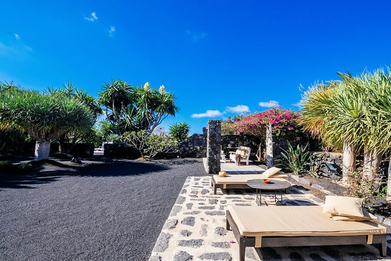 Sunbathing area in the volcanic gardens