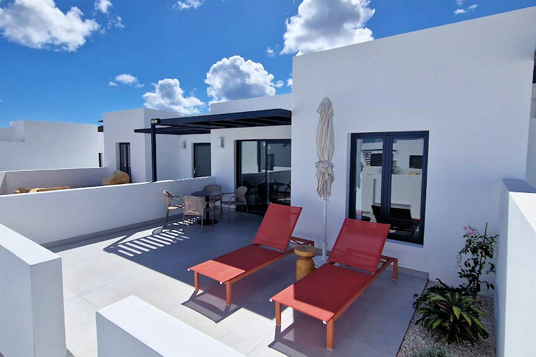 Each apartment has its own terrace with sun-loungers