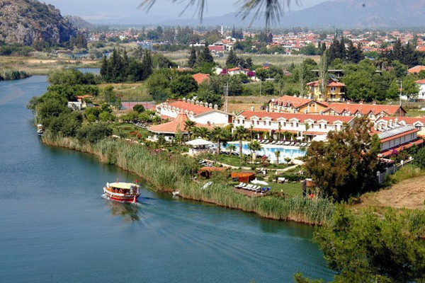 The Dalyan Resort Hotel stands on the riverbank