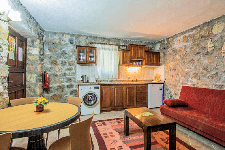 Typical living-dining room with open-plan kitchen