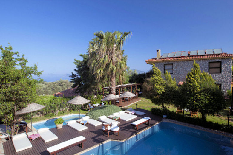 The pool and main wing at Mandarin Boutique Hotel