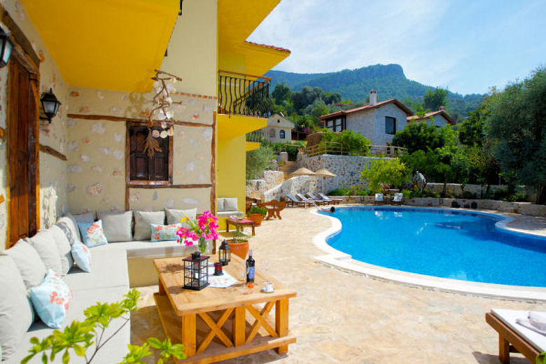 View across Mango's pool towards the Pool Villas on the right