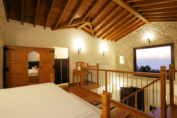 Pool villa bedroom with panoramic window