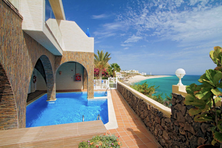 The pool at Atalaya and view towards Jandia Beach