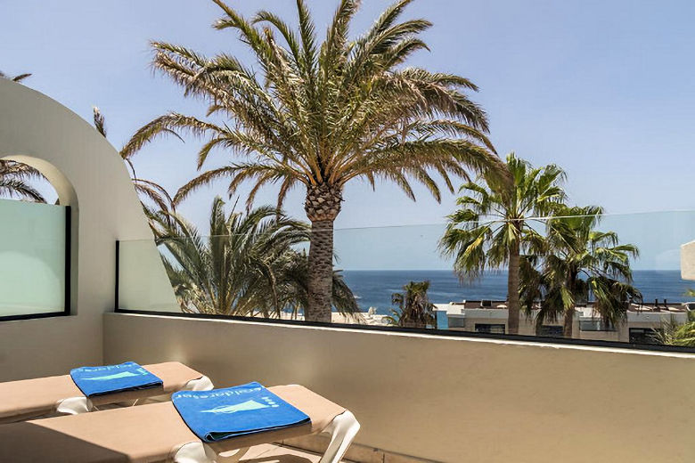 Upper-floor balcony off the bedroom in a Duplex Apartment