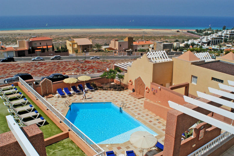 View across the pool down towards the beach