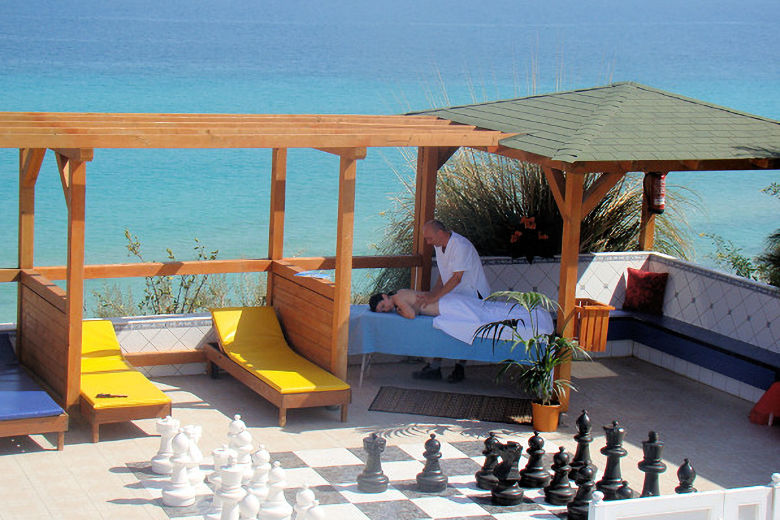 Enjoy a massage overlooking the sea