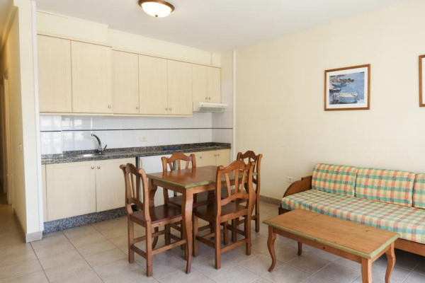 Living room with open-plan kitchen