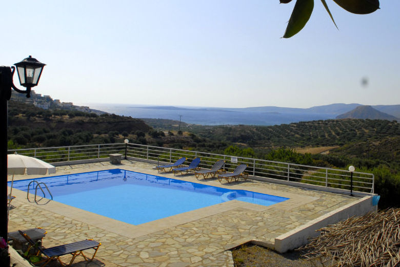 The pool at Kouremenos boasts panoramic coastal views