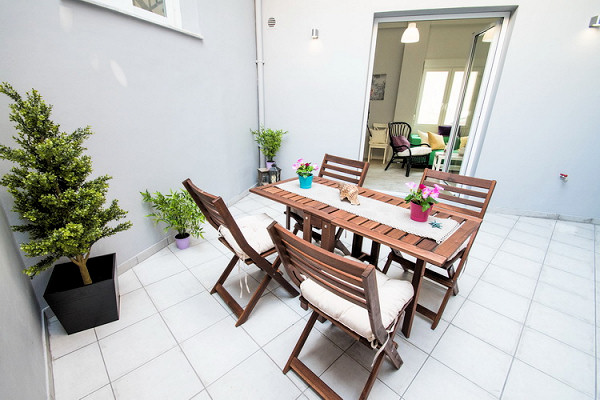 The ground floor apartment's courtyard patio 