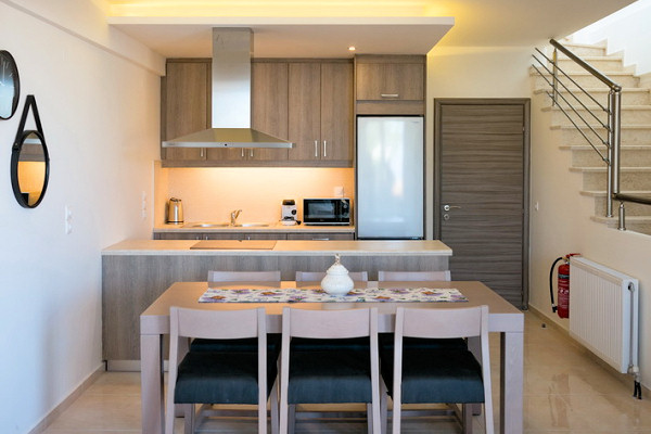 Dining area and open-plan kitchen