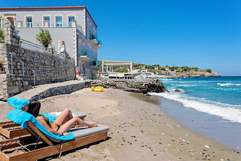 Thalassa Boutique Hotel stands next to a small beach