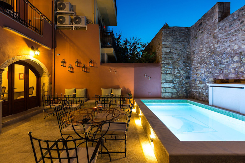 The courtyard and plunge pool in the evening