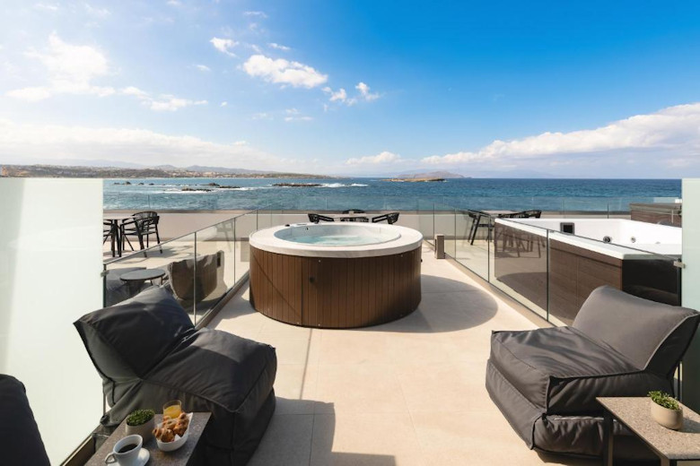 A Sunlounge Seafront Suite with Outdoor Hot Tub