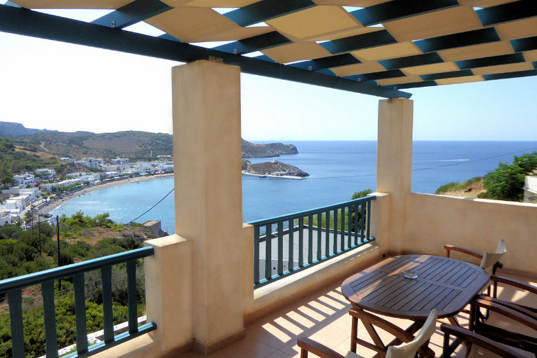 View from an upper-floor balcony towards Kapsali beach