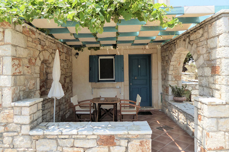 Shaded terrace of a ground-floor studio