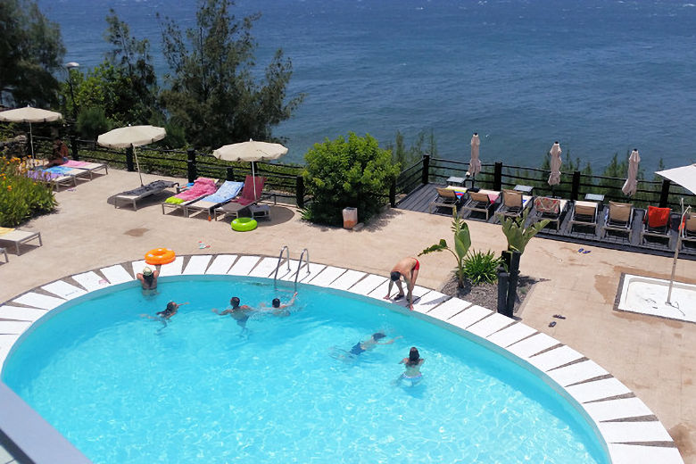 View across the pool to the sea