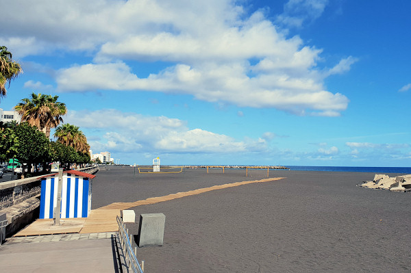 The nearby town beach