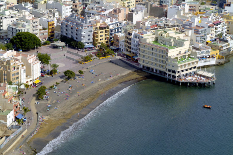 The hotel is built into the ocean right next to the beach