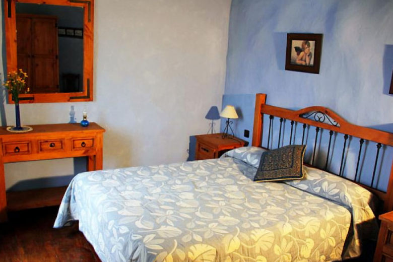 Upper floor bedroom in La Bodega de San Marcos