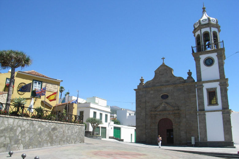 The hotel stands opposite the village church