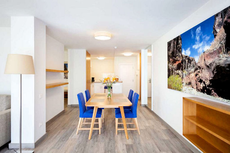 Dining area and open-plan kitchen in an apartment