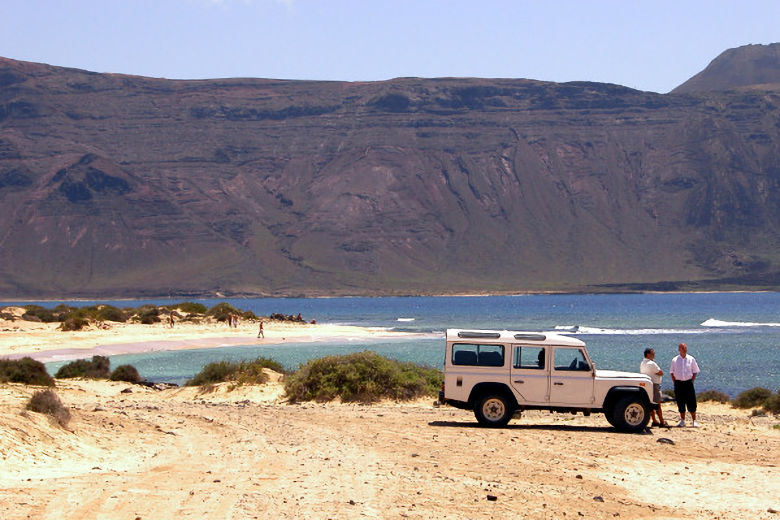 Local transport and view of the Famara cliffs on Lanzarote