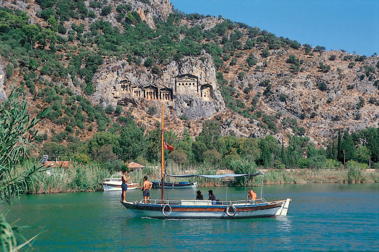 View across the river to the rock tombs